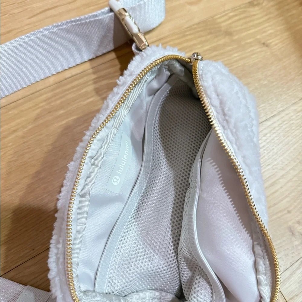 Lululemon white fluffy belt bag NEVER WORN. - Picture 2 of 2